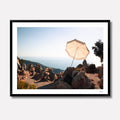Fine art photography titled 'Cream' by Venturer Studios, featuring a solitary cream-colored umbrella on a serene coastal beach in Western Turkey. The minimalist landscape is presented in a premium black gallery frame.